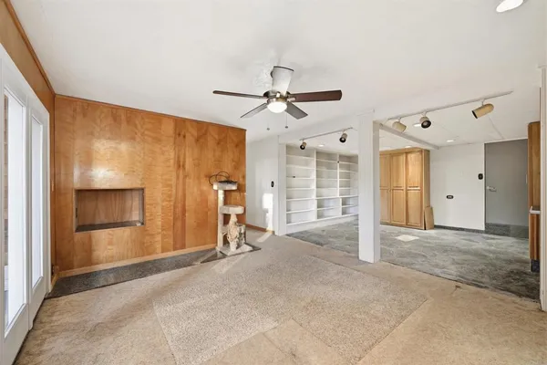 a view of empty room with windows