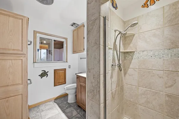 a view of a balcony with chairs