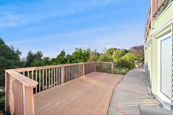 a view of a house with a street