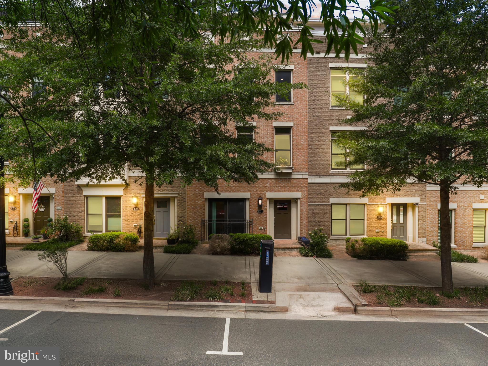 1521 16th Road North Arlington, VA 22209 - Photo 1 of 59 a front view of a house with a yard