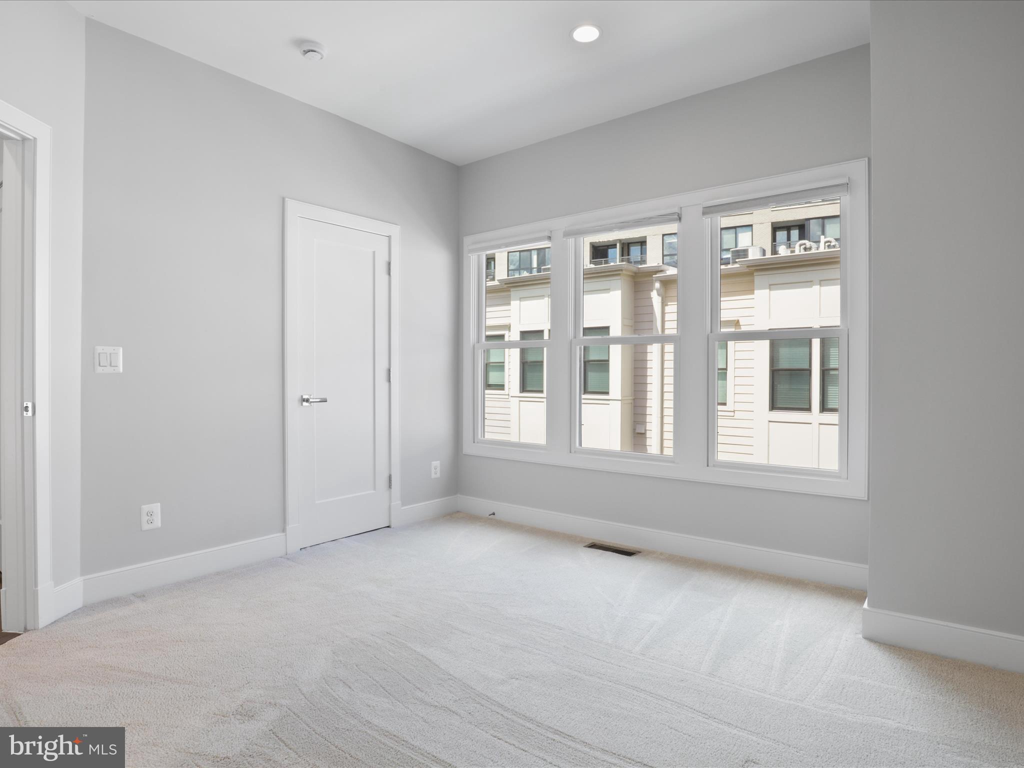 1521 16th Road North Arlington, VA 22209 - Photo 38 of 59 a view of an empty room with a window
