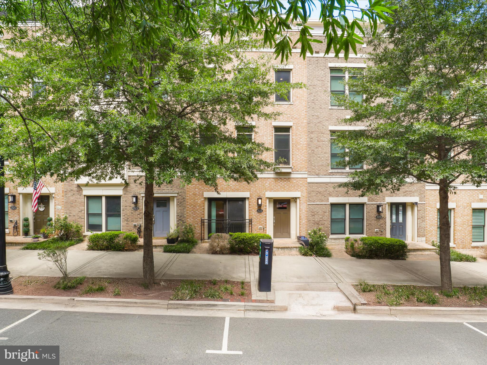 1521 16th Road North Arlington, VA 22209 - Photo 4 of 59 a front view of a house with a yard