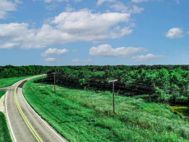 a view of a garden from a balcony