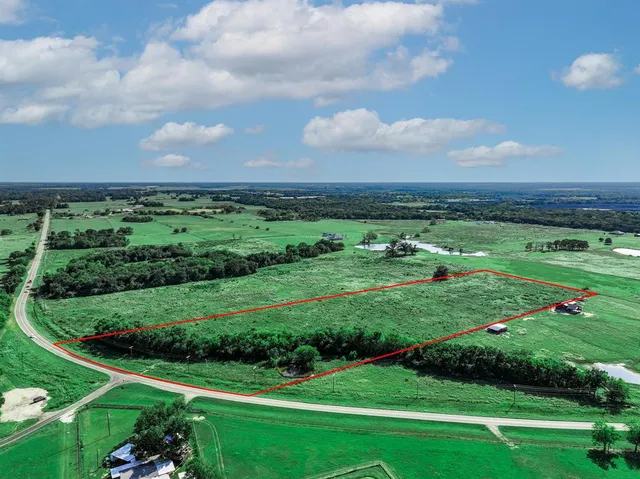 a view of a golf course with a garden
