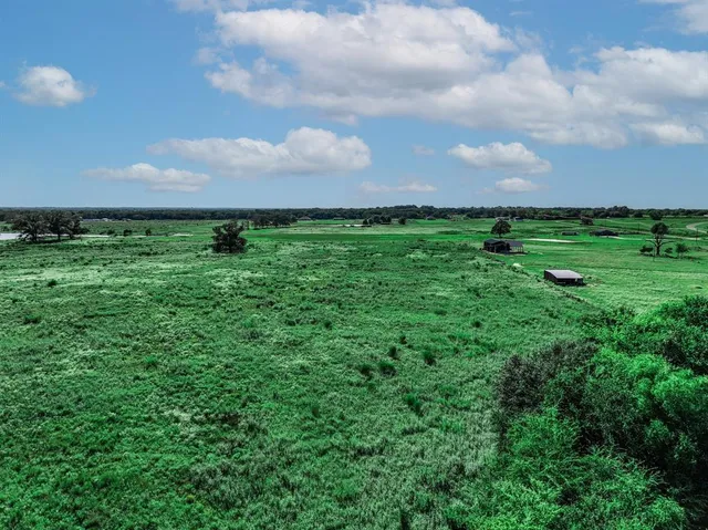 a view of a garden with a houses