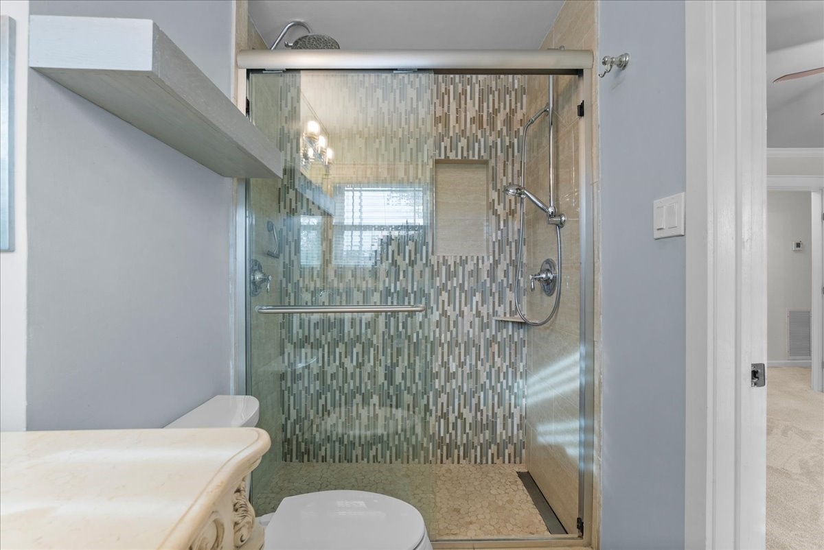 1572 Silverpines Road, Unit 572 Houston, TX 77062 - Photo 19 of 37 The primary bath shower was definitely updated with self-care and relaxation in mind. Step in to wash away the cares of the day!