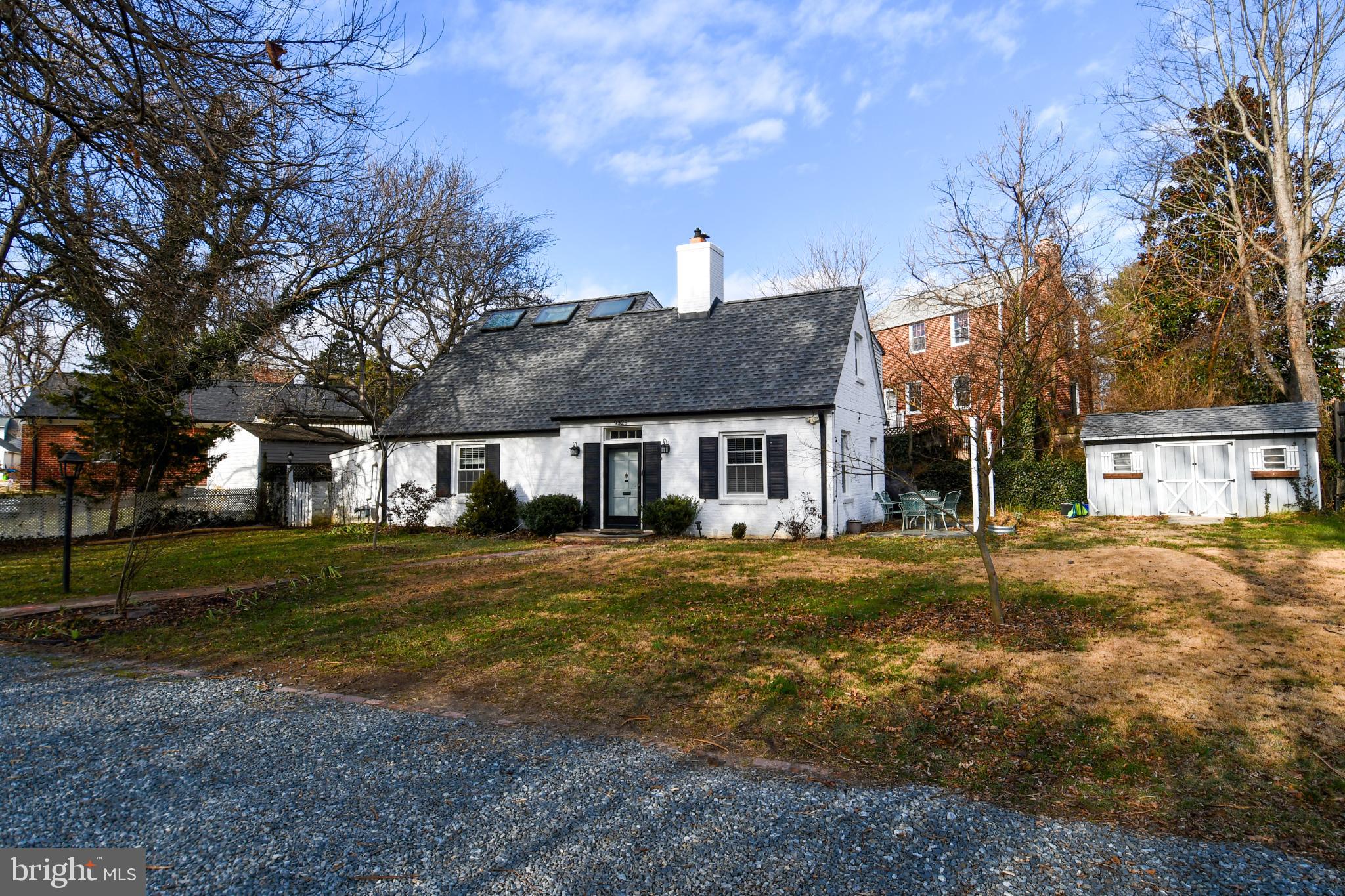 9325 Long Branch Parkway Silver Spring, MD 20901 - Photo 1 of 27 a front view of a house with a yard