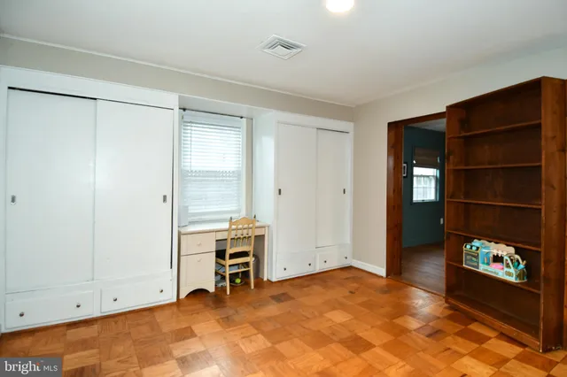 a view of room with an empty space and a window