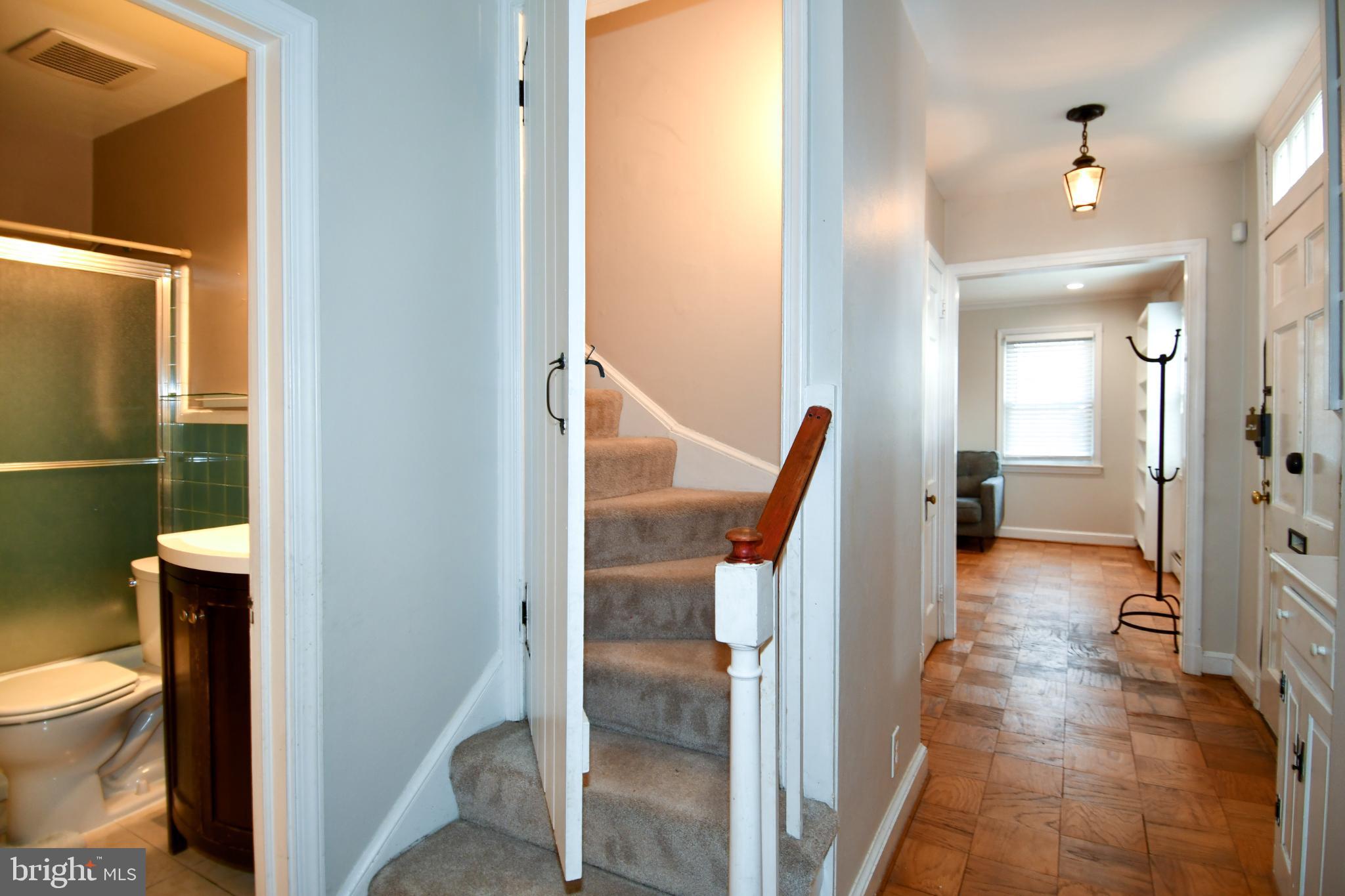 9325 Long Branch Parkway Silver Spring, MD 20901 - Photo 16 of 27 a view of a bathroom from a hallway