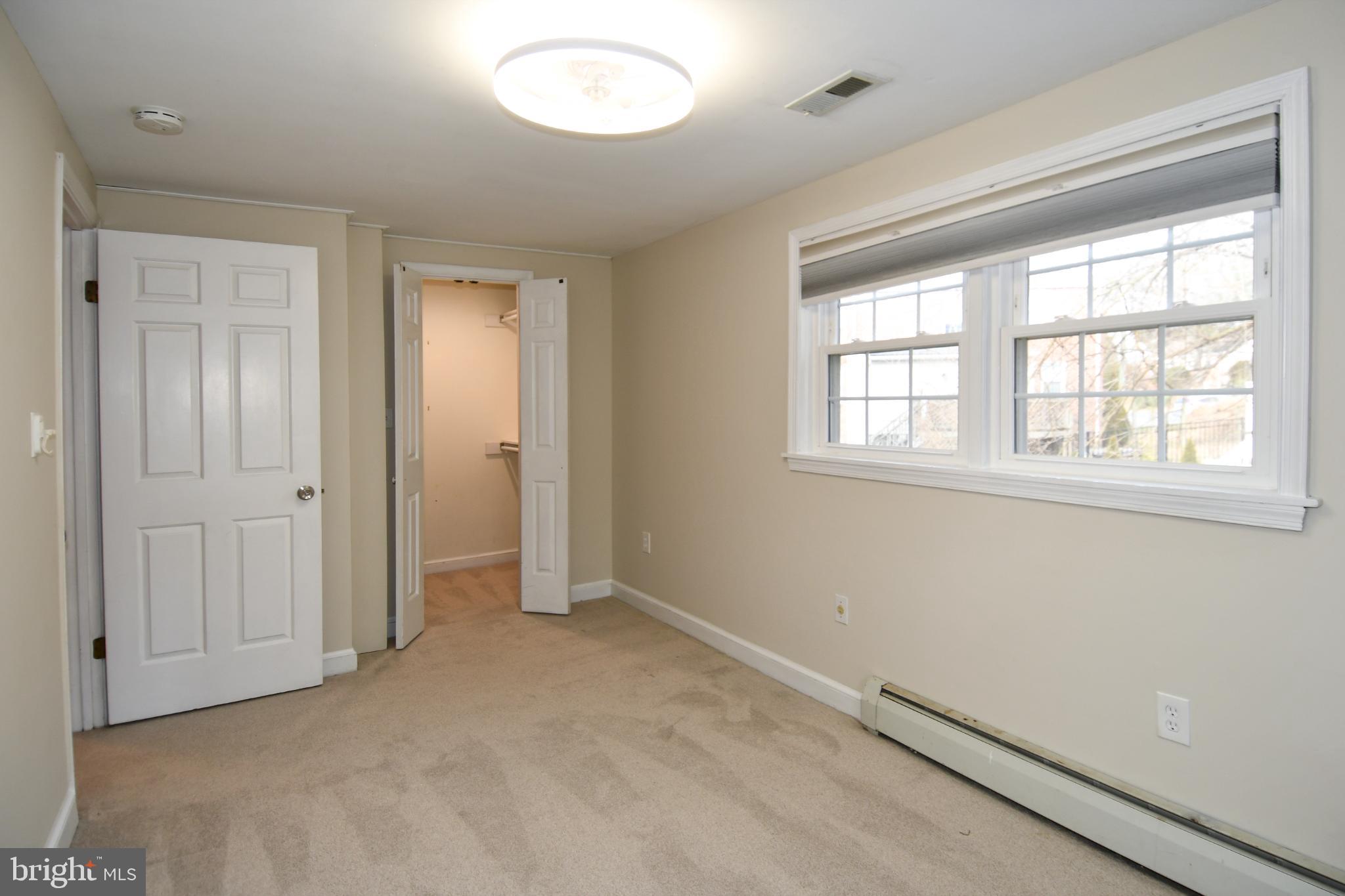 9325 Long Branch Parkway Silver Spring, MD 20901 - Photo 22 of 27 an empty room with windows