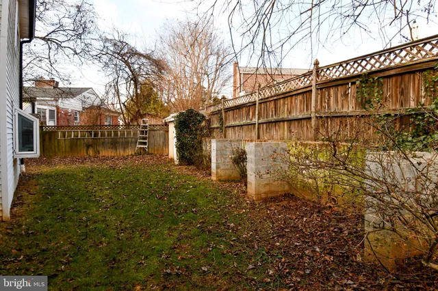 a view of a street with a building in the background
