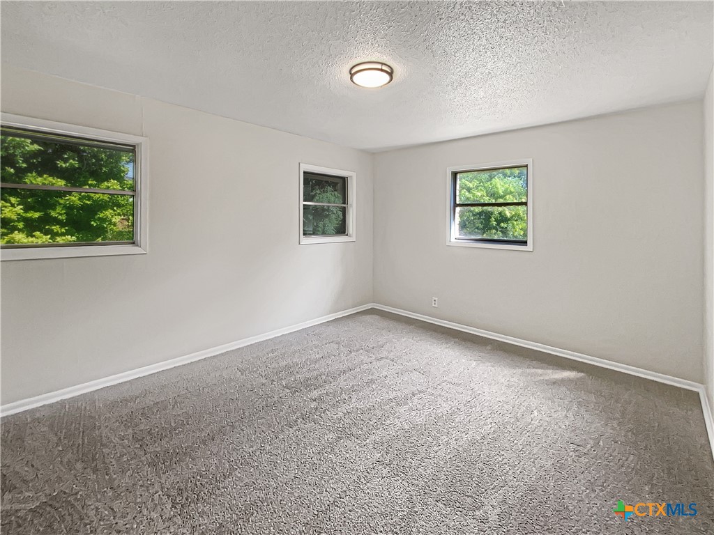 3202 Magnolia Boulevard Temple, TX 76502 - Photo 5 of 20 an empty room with windows
