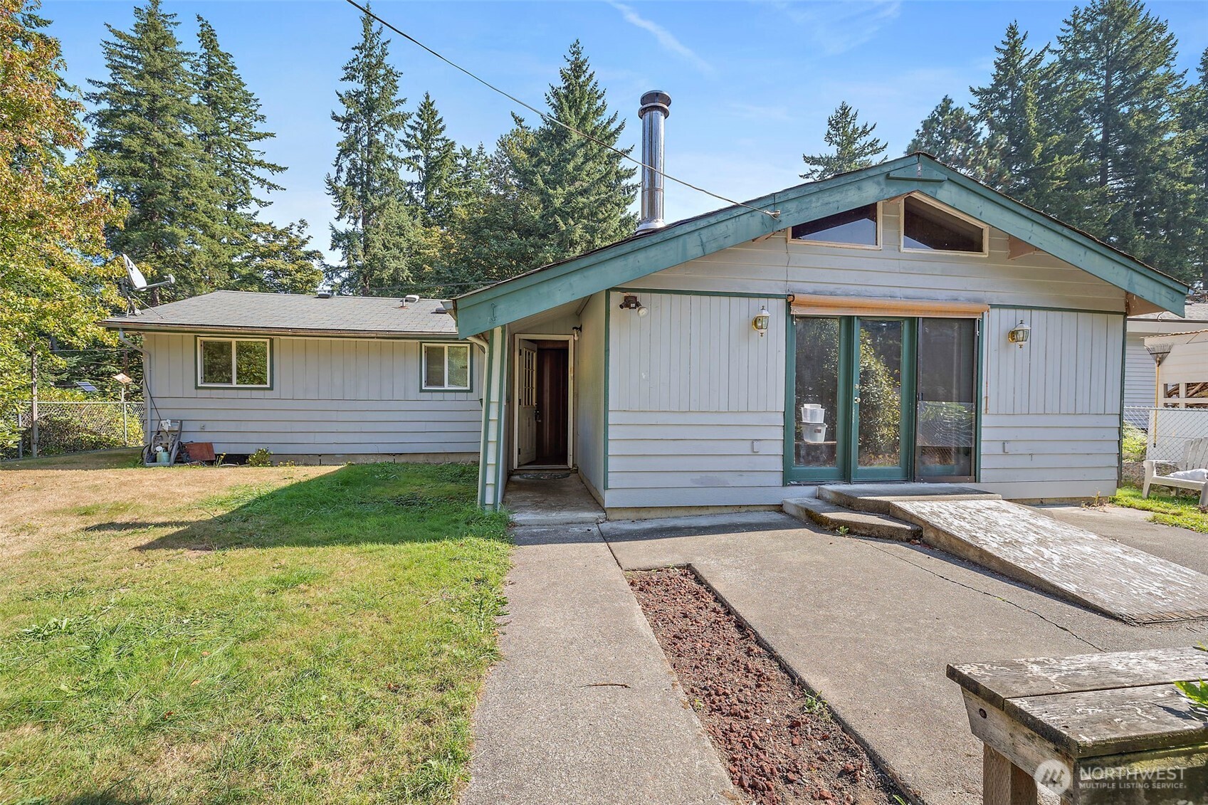 13435 Patriot Way Renton, WA 98059 - Photo 2 of 36 a front view of a house with a yard