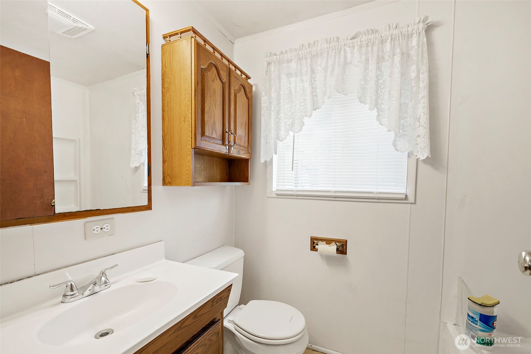 13435 Patriot Way Renton, WA 98059 - Photo 21 of 36 a bathroom with a sink a toilet and mirror