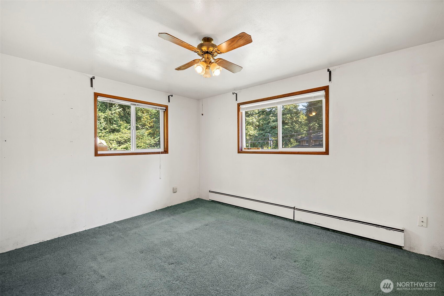 13435 Patriot Way Renton, WA 98059 - Photo 22 of 36 a view of an empty room with a window