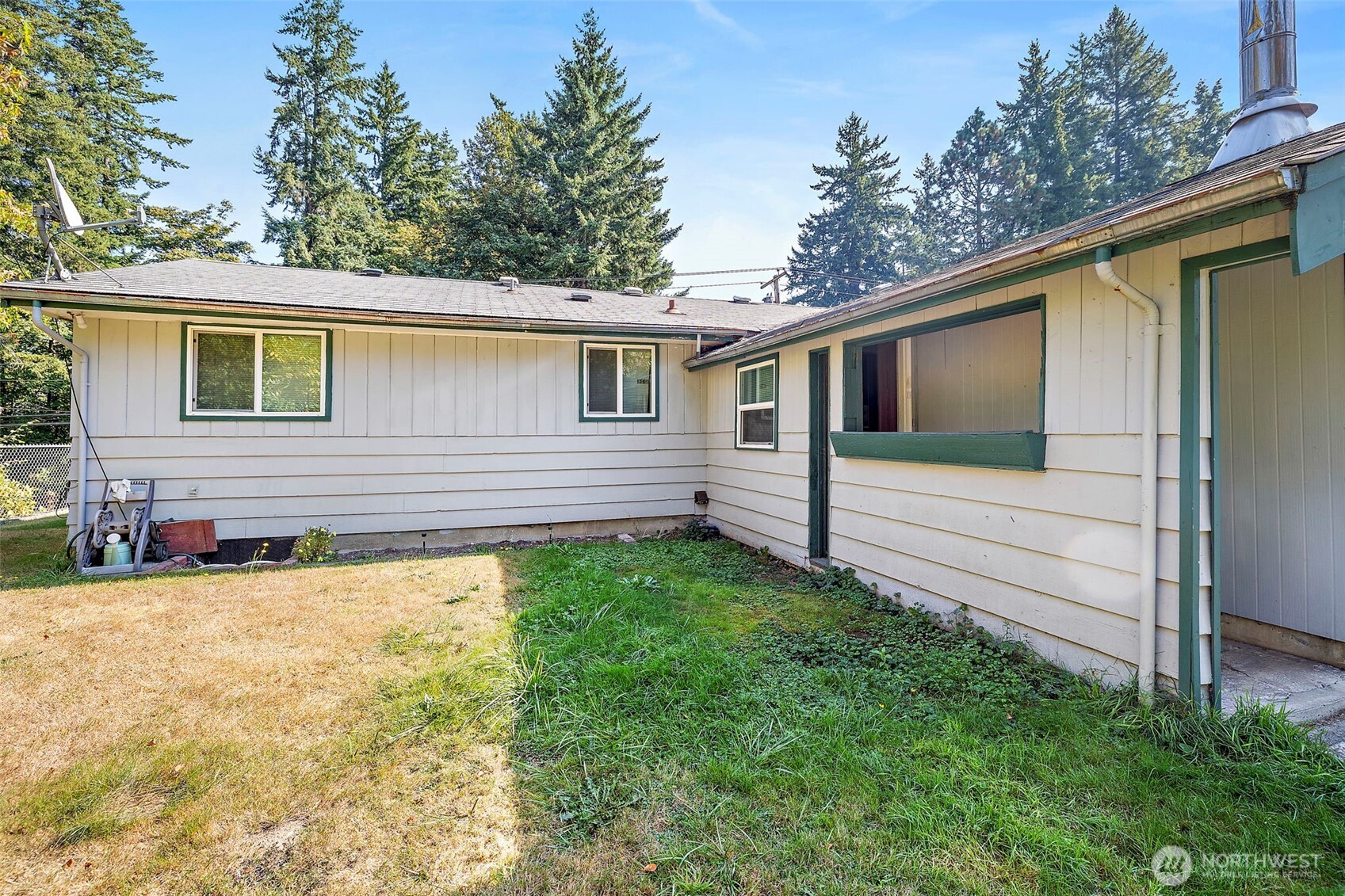 13435 Patriot Way Renton, WA 98059 - Photo 27 of 36 a view of a house with a backyard