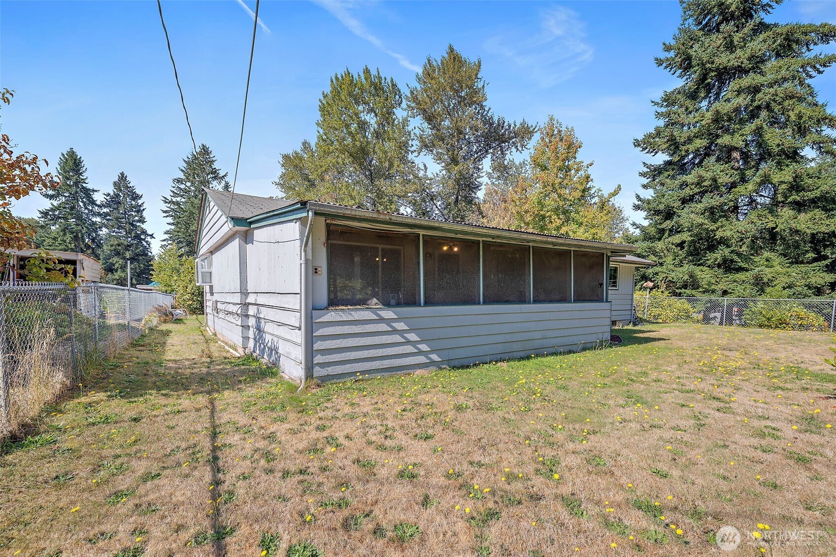 13435 Patriot Way Renton, WA 98059 - Photo 29 of 36 a front view of a house with a yard