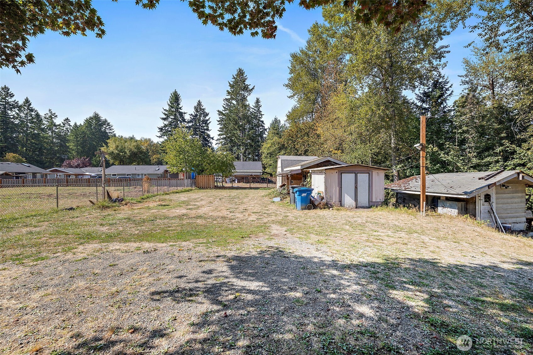 13435 Patriot Way Renton, WA 98059 - Photo 30 of 36 a view of a house with backyard and trees