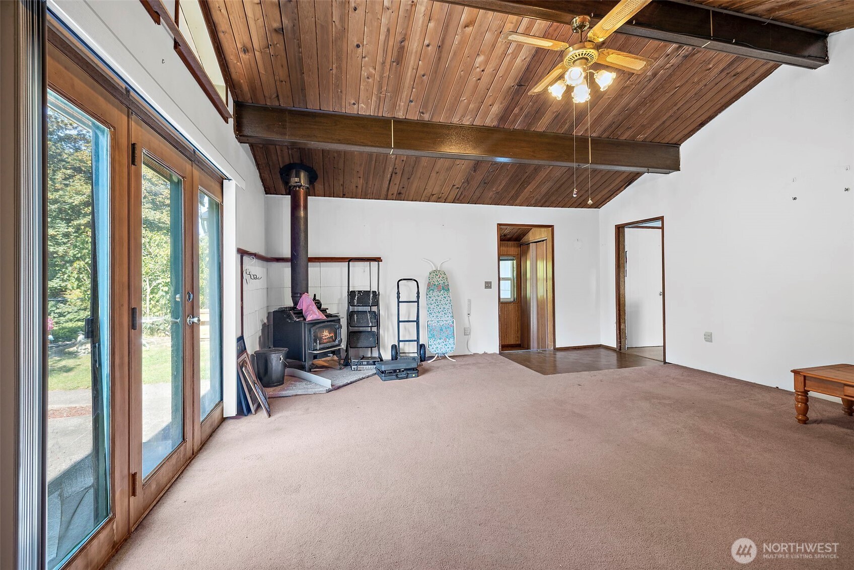 13435 Patriot Way Renton, WA 98059 - Photo 6 of 36 a view of a room with gym equipment and a large window