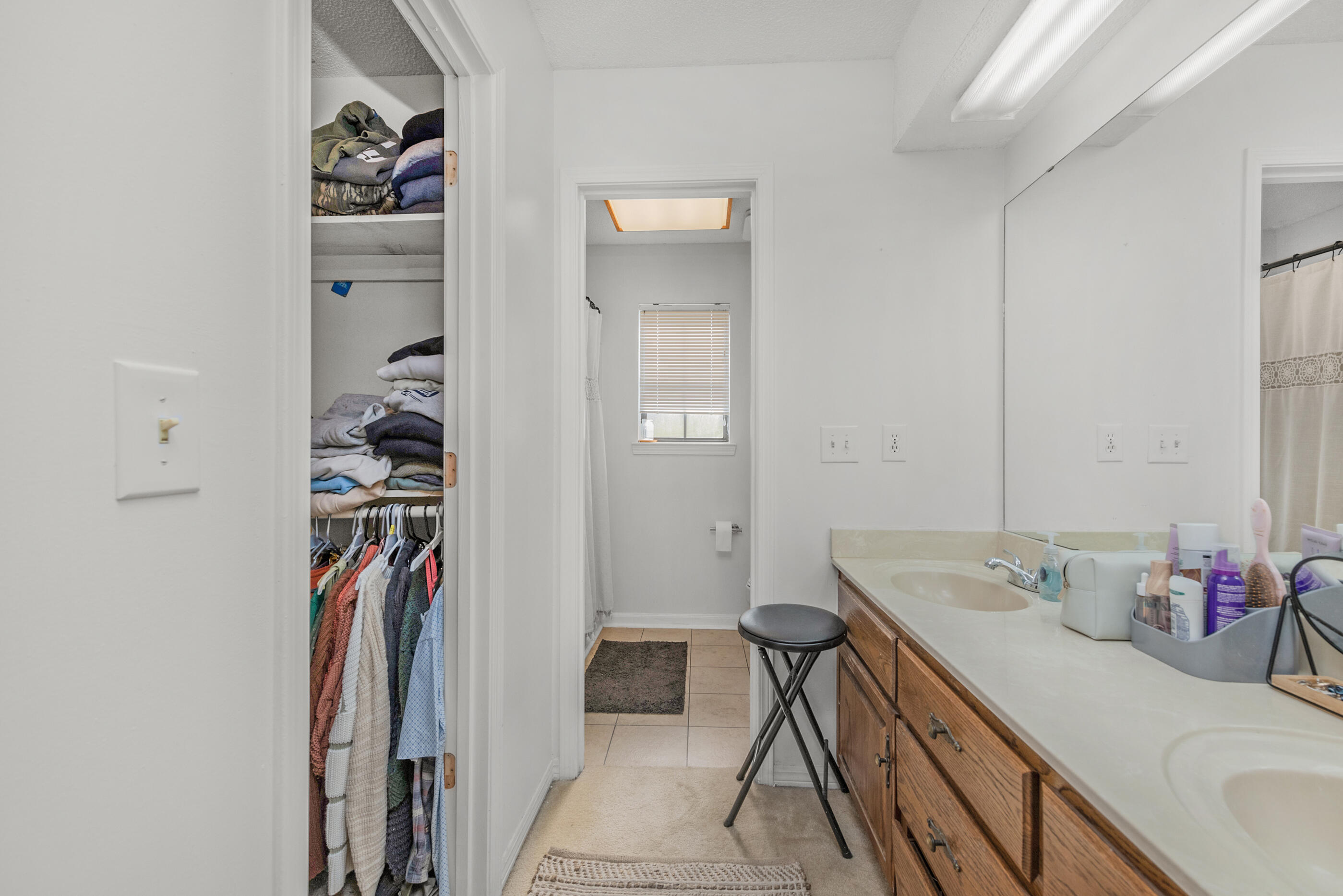 2788 Keats Drive Crestview, FL 32539 - Photo 19 of 32 a bathroom with a sink and a mirror
