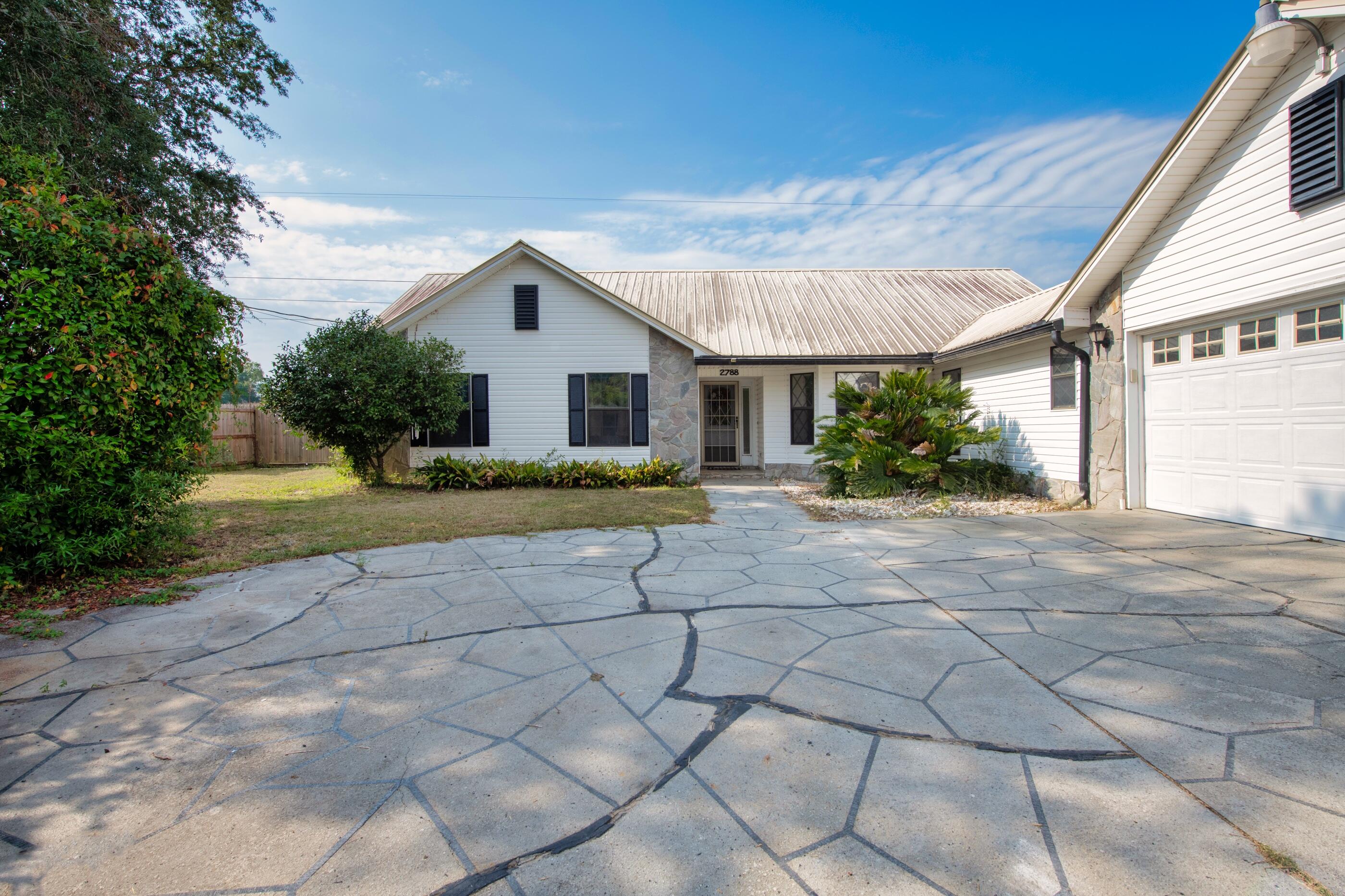 2788 Keats Drive Crestview, FL 32539 - Photo 2 of 32 a house view with a outdoor space