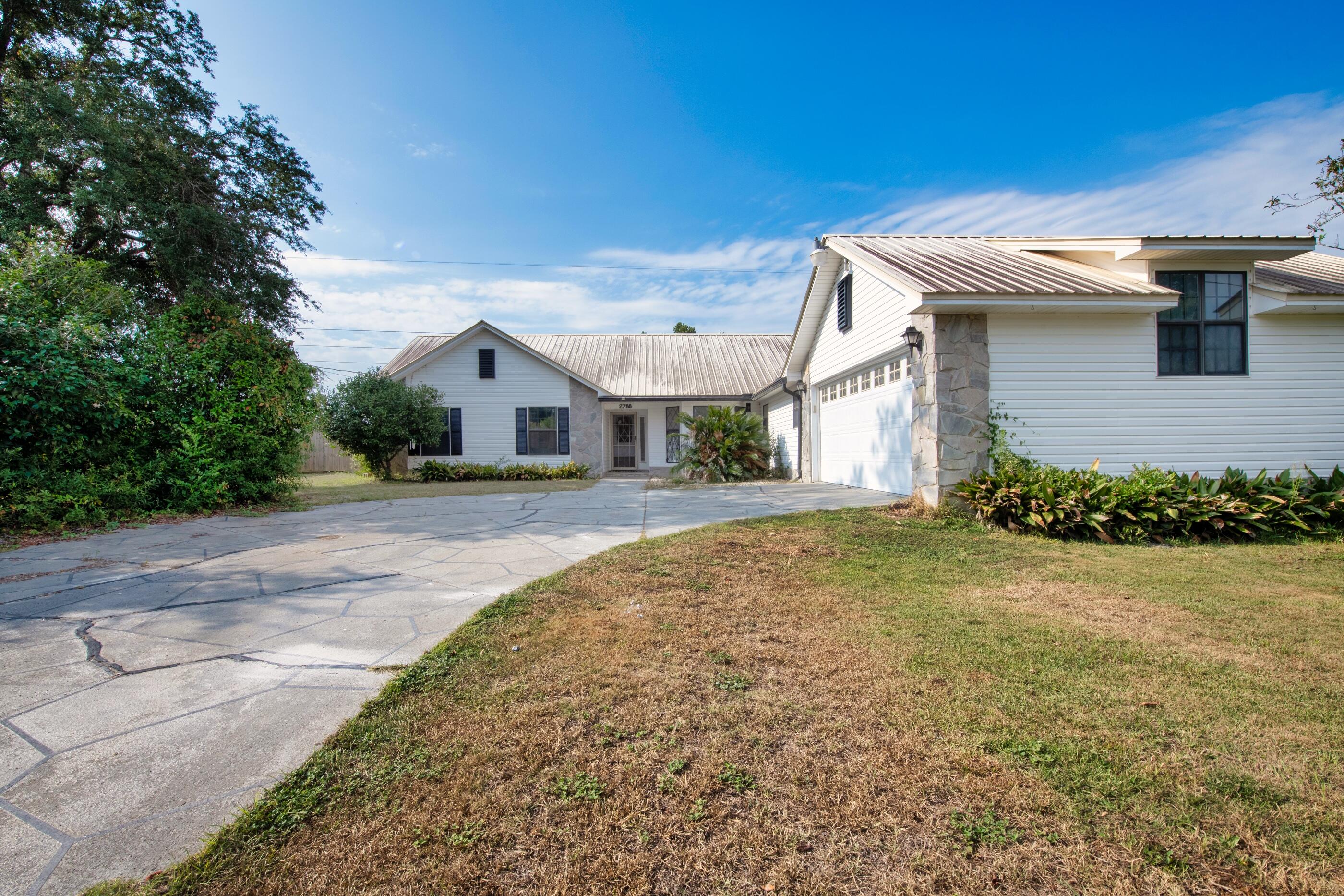 2788 Keats Drive Crestview, FL 32539 - Photo 3 of 32 a view of a house with a yard
