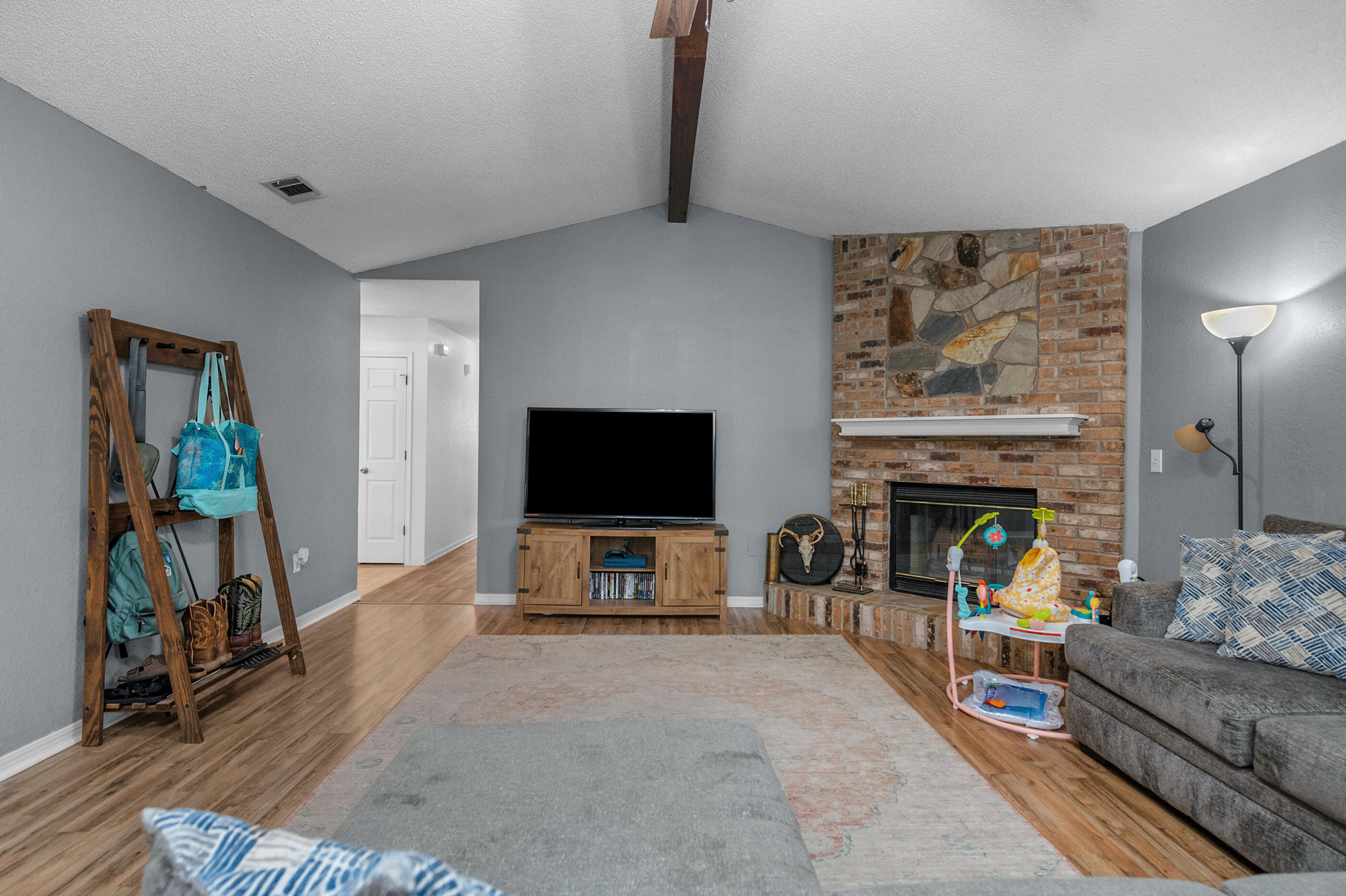 2788 Keats Drive Crestview, FL 32539 - Photo 8 of 32 a living room with furniture and a flat screen tv