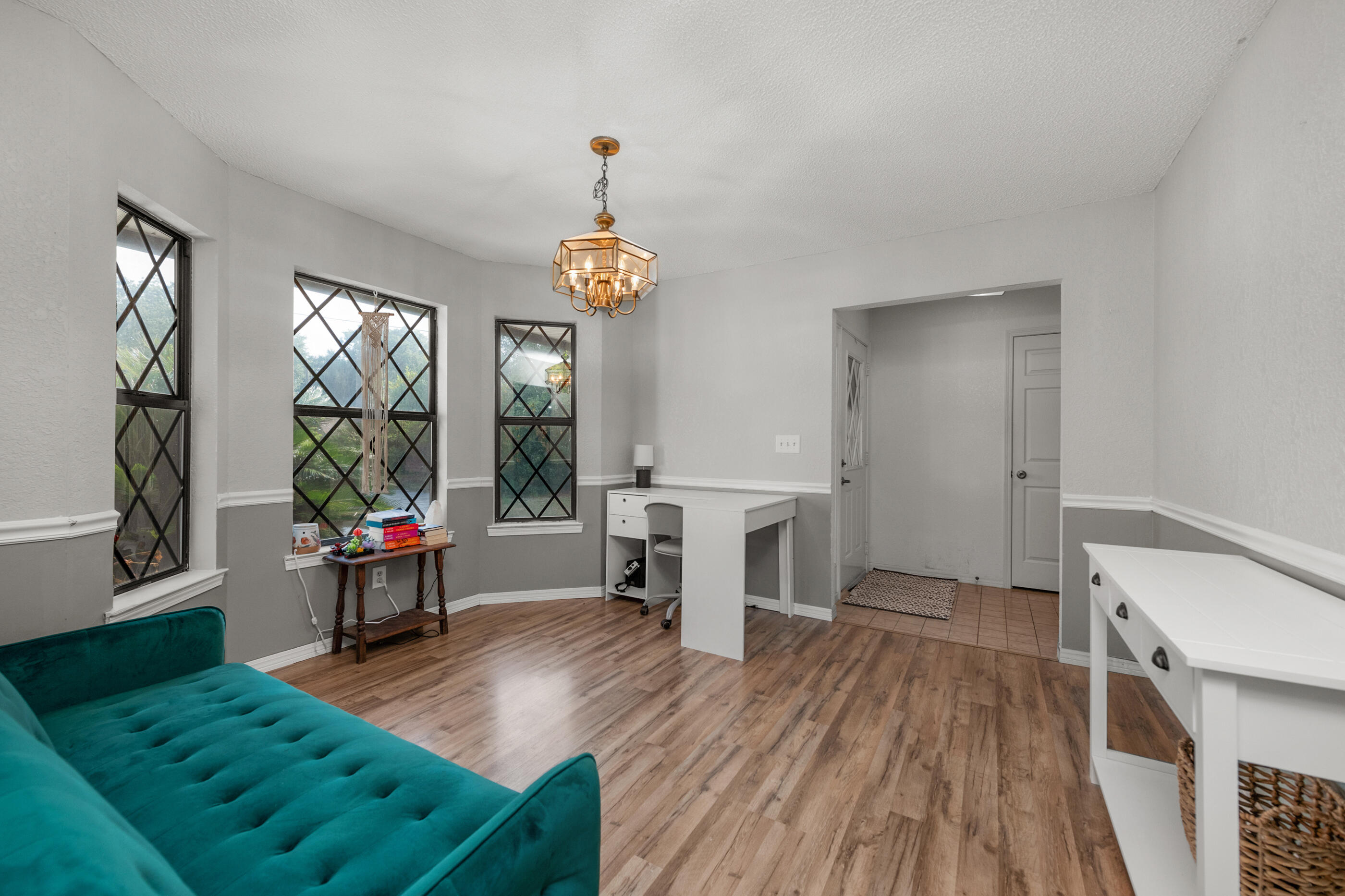 2788 Keats Drive Crestview, FL 32539 - Photo 10 of 32 a living room with furniture and a wooden floor