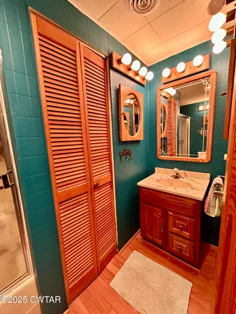 a front view of a house with a garden and patio