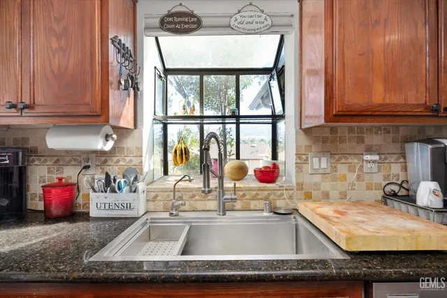 a bedroom with a bed and a mirror