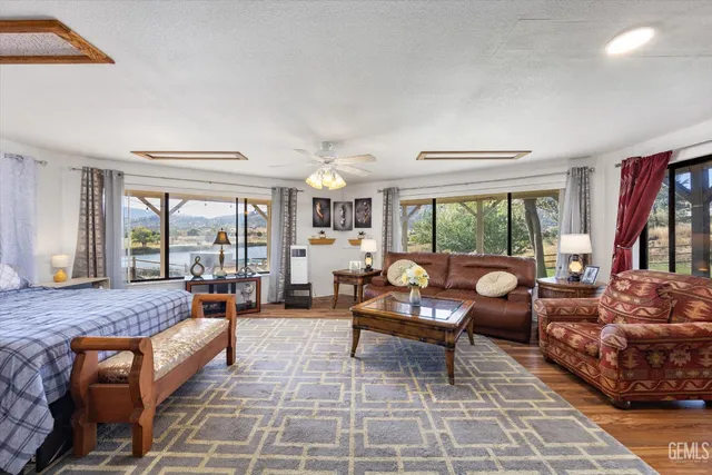 a kitchen that has a sink and a stove in it