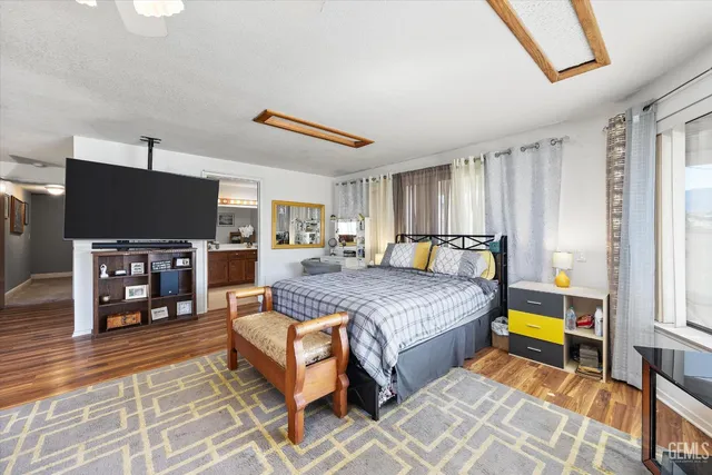 a view of a two chairs in the balcony