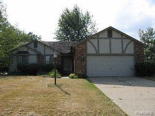 1320 Deerhurst Lane Rochester, MI 48307 - Photo 1 of 1 Front