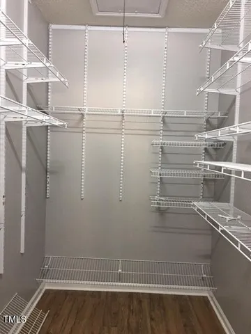 a view of a room with racks on the wall