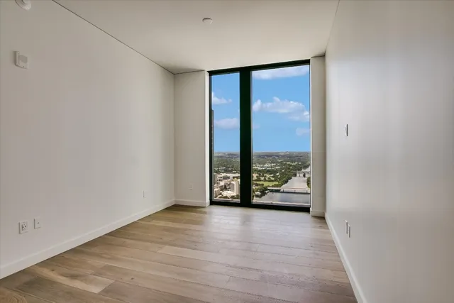 a view of an empty room with window