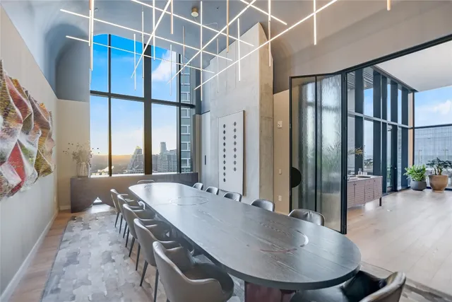 an open kitchen with a table and chairs