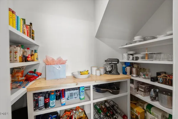 a room with furniture and a wooden floor