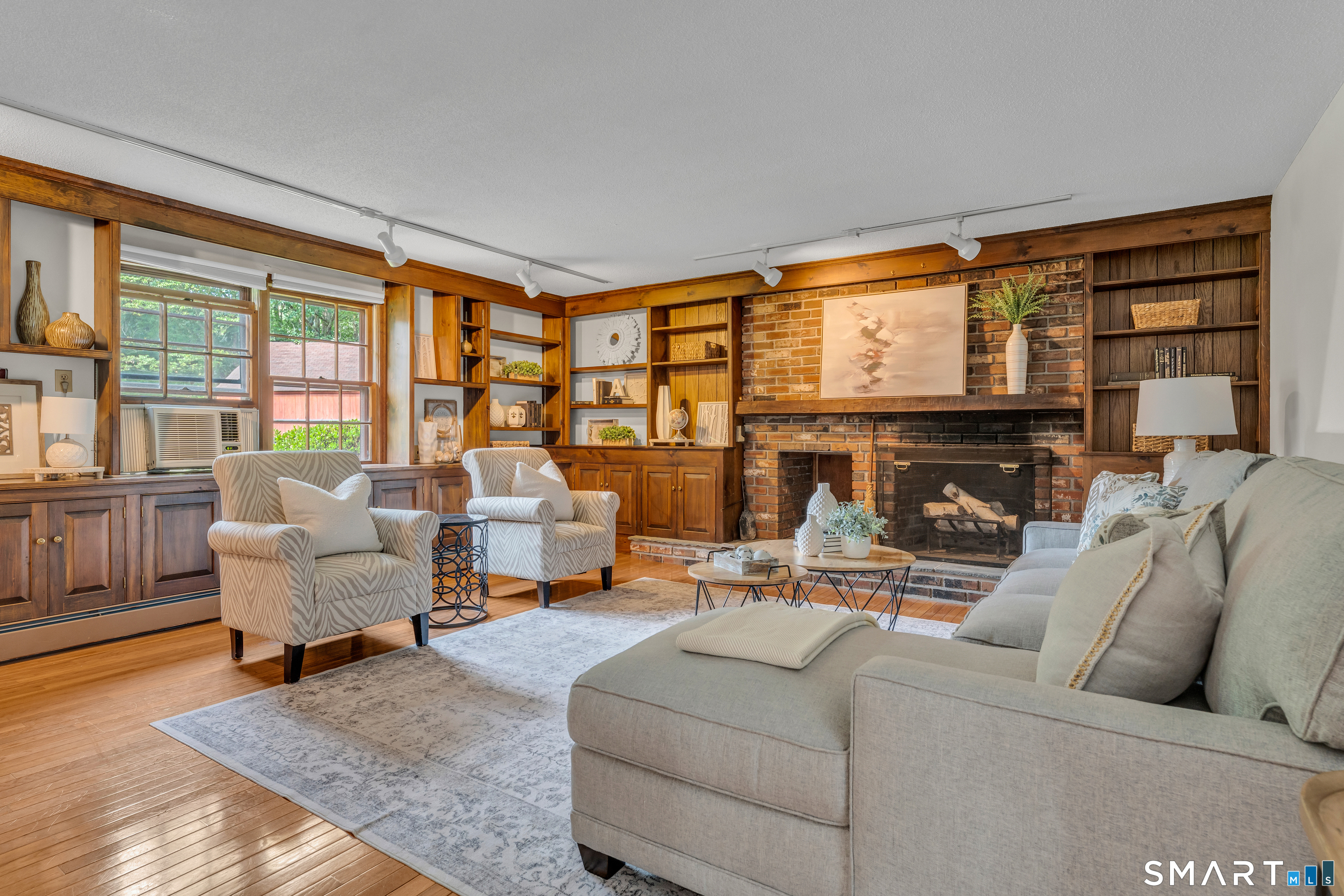 289 South Hoop Pole Road Guilford, CT 06437 - Photo 2 of 38 Spacious Family room with one of two fireplaces