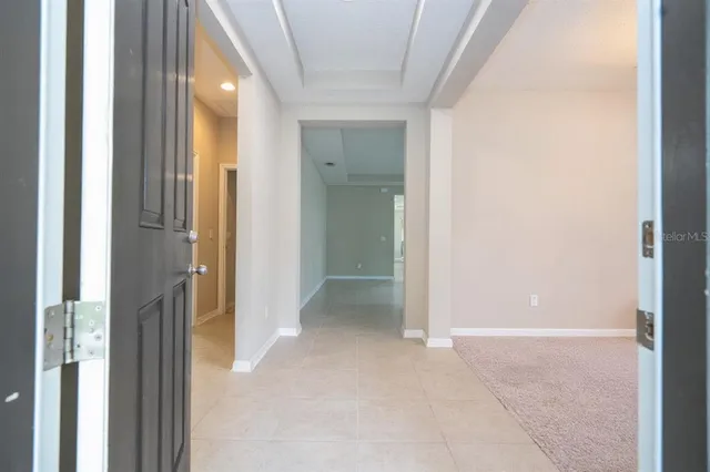 a view of a bathroom with a glass door