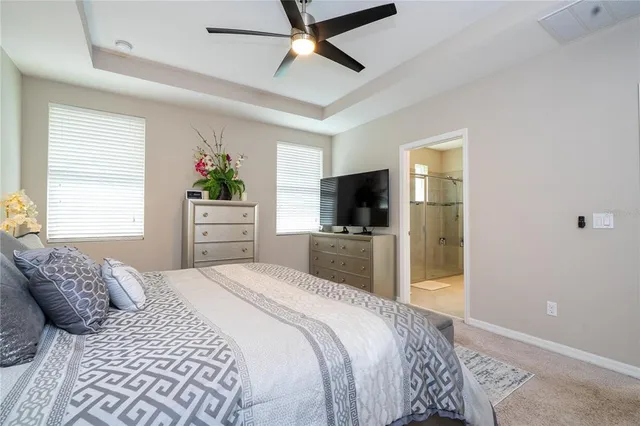 a view of bathroom with a sink and a mirror