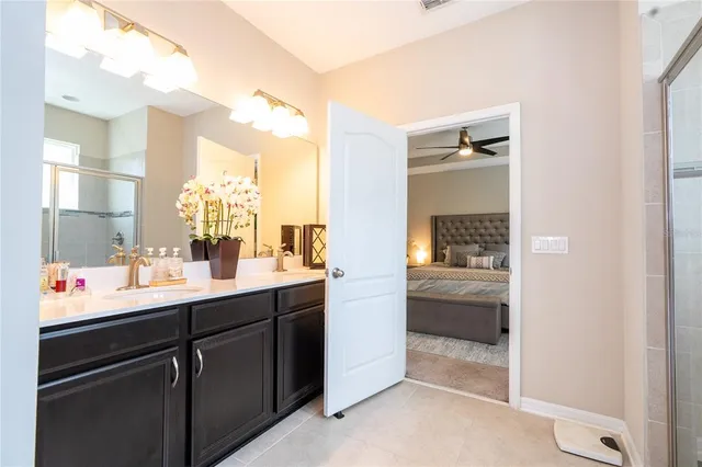 an aerial view of a house with swimming pool patio and outdoor seating