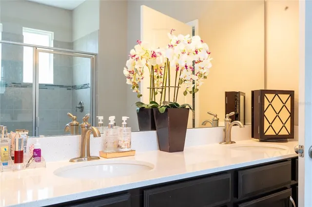 a view of a lake with houses in the background