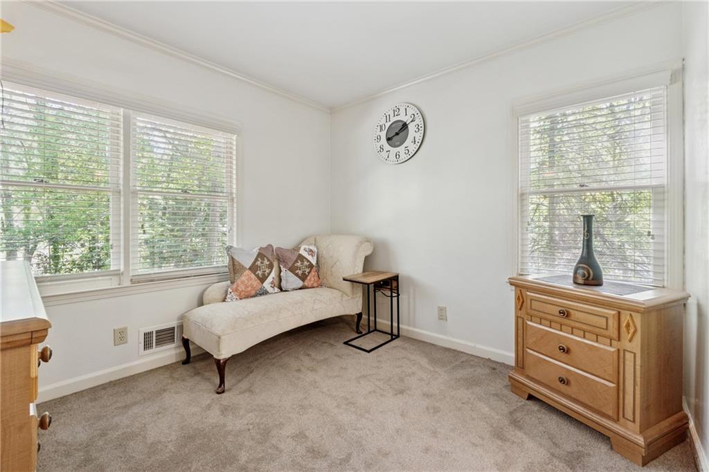 1387 Springdale Road Gainesville, GA 30501 - Photo 25 of 49 a living room with furniture and a window