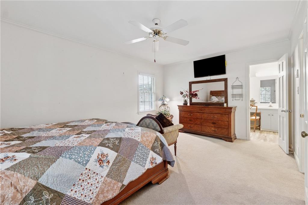 1387 Springdale Road Gainesville, GA 30501 - Photo 28 of 49 a bed room with a bed and a television