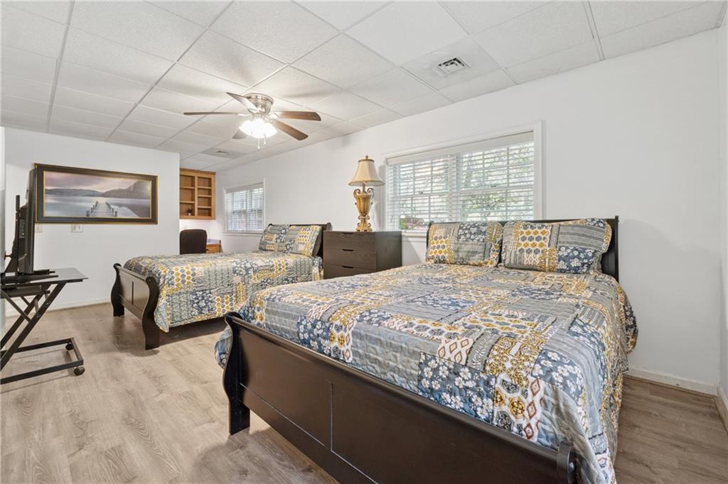 1387 Springdale Road Gainesville, GA 30501 - Photo 32 of 49 a bedroom with double bed and a window