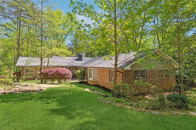 front view of a house with a yard