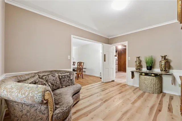 a living room with furniture and a table