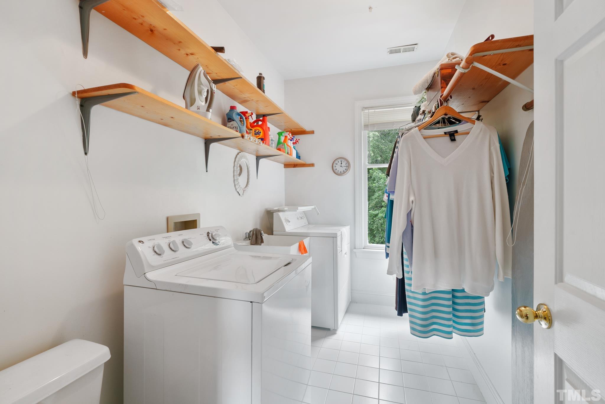 920 Windrow Lane Raleigh, NC 27603 - Photo 33 of 40 a utility room with dryer and washer