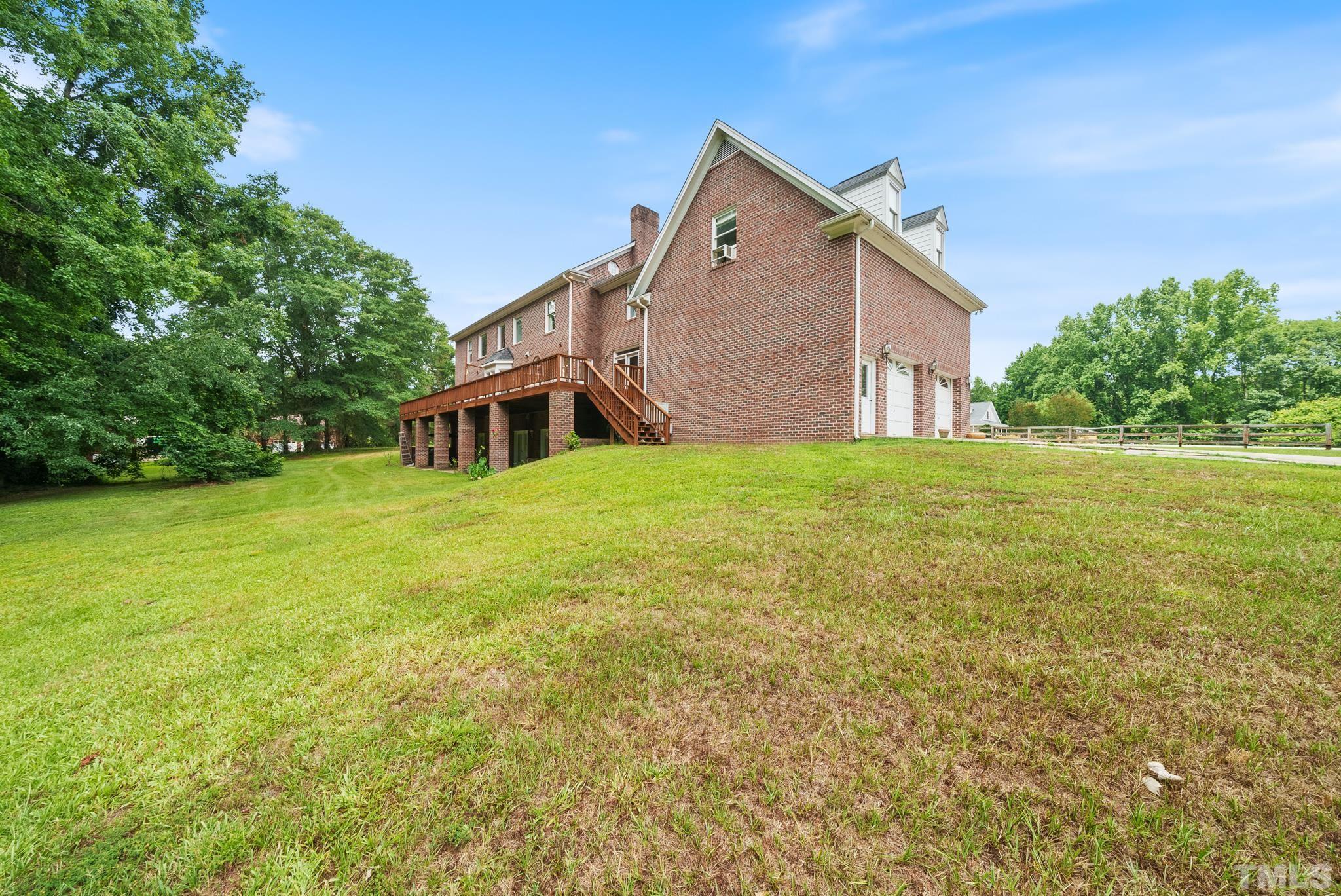920 Windrow Lane Raleigh, NC 27603 - Photo 36 of 40 a view of a house with a yard