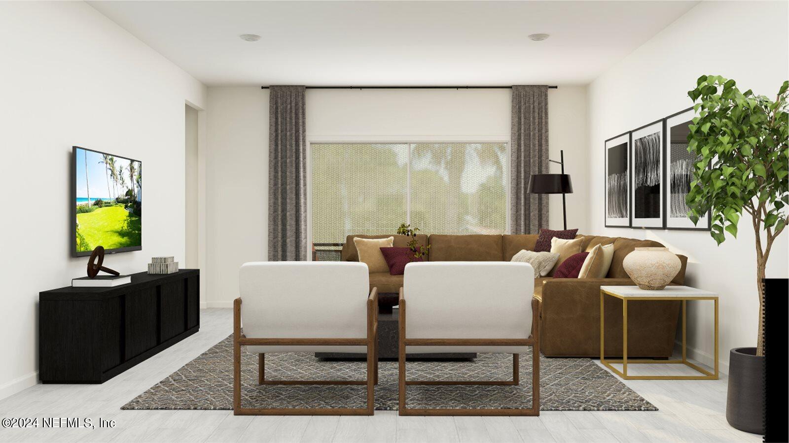 117 Round Robin Run St. Johns, FL 32259 - Photo 13 of 17 a living room with furniture a large window and a potted plant